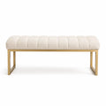 Banco de terciopelo beige con estructura metálica dorada
